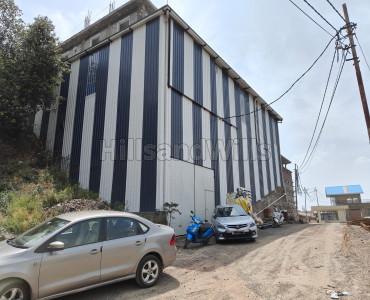 7000 sq. ft factory for sale  in waknaghat solan along with 690 sq.meter land